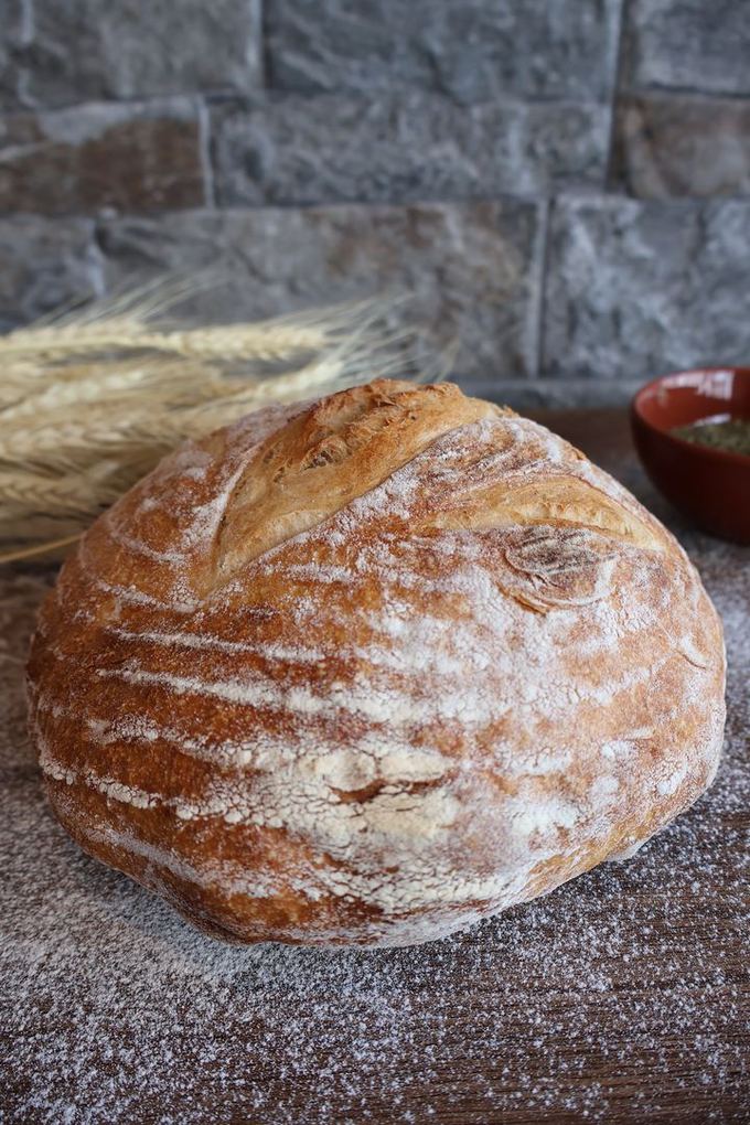 Crusty white sourdough loaf photographed for Kato Edno Vreme bakery in Sofia