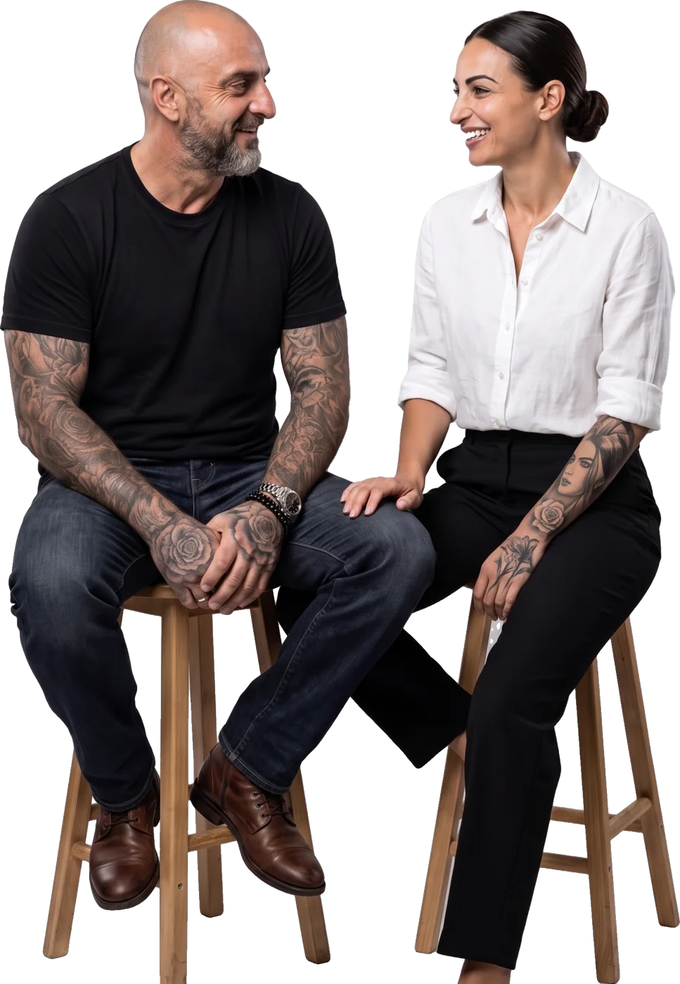 Colin and Neli sitting on stools, chatting
