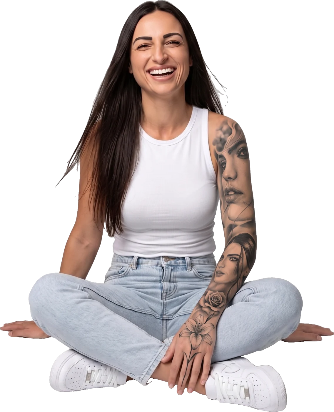 Neli Rooney sitting cross-legged and laughing